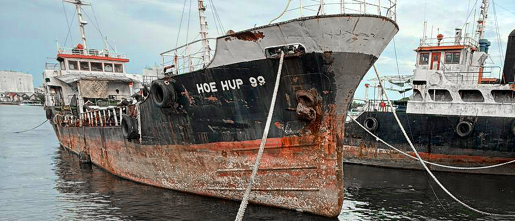 Golden liquid being poured, creating bubbles.